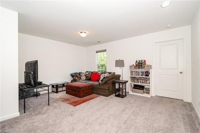 1026 Baileys Chapel Rd, Advance, NC 27006 - carpeted living room with baseboards