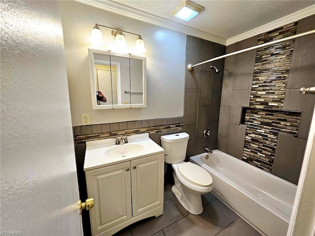 full bathroom with tile patterned flooring, crown molding, vanity, and toilet