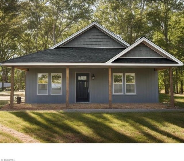 view of front of home with a front lawn