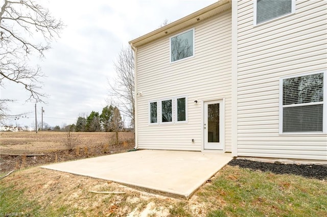 rear view of property featuring a patio area