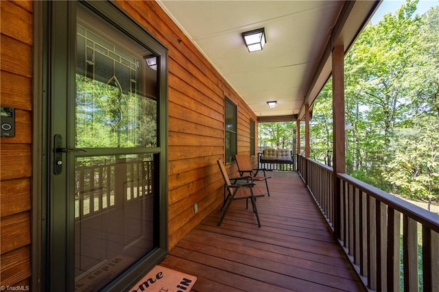wooden terrace with covered porch