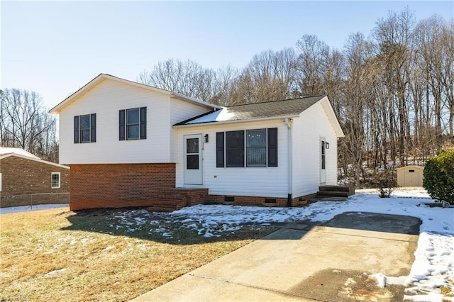 tri-level home with a shed