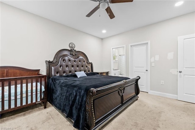 bedroom with light carpet and ceiling fan