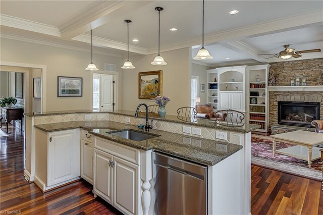 925 Salem Glen Ct, Clemmons, NC 27012 - kitchen featuring stainless steel dishwasher, dark wood finished floors, ornamental molding, a ceiling fan, and dark stone countertops