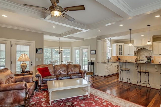 925 Salem Glen Ct, Clemmons, NC 27012 - living area with dark wood finished floors, ceiling fan, recessed lighting, crown molding, and a chandelier
