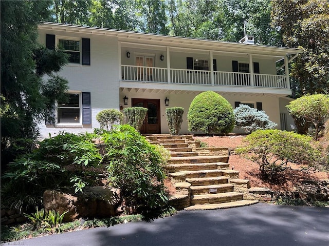 590 Knob View Dr, Winston-Salem, NC 27104 - view of front of property with a balcony, french doors, stairs, and stucco siding