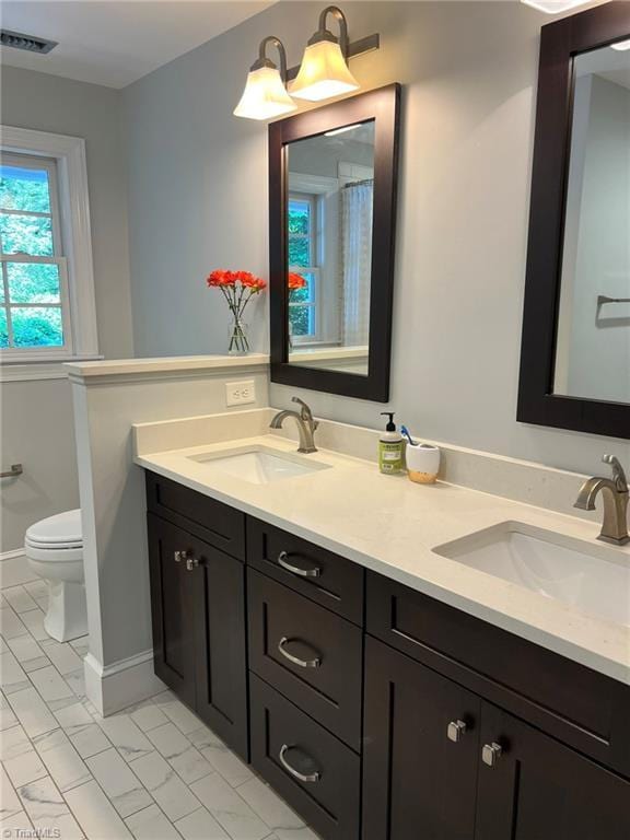 590 Knob View Dr, Winston-Salem, NC 27104 - full bath with double vanity and tile patterned flooring