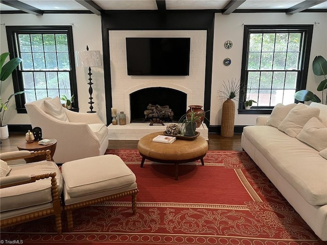 590 Knob View Dr, Winston-Salem, NC 27104 - living room with beam ceiling, wood finished floors, and a fireplace