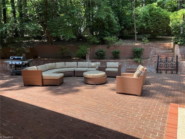 590 Knob View Dr, Winston-Salem, NC 27104 - fenced backyard featuring an outdoor hangout area, a patio, and area for grilling
