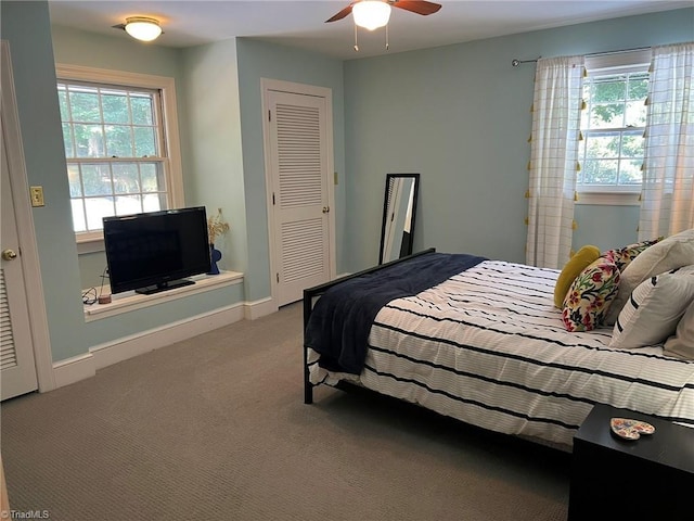 590 Knob View Dr, Winston-Salem, NC 27104 - carpeted bedroom featuring a ceiling fan and a closet