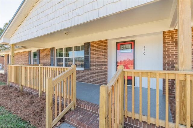 entrance to property with covered porch