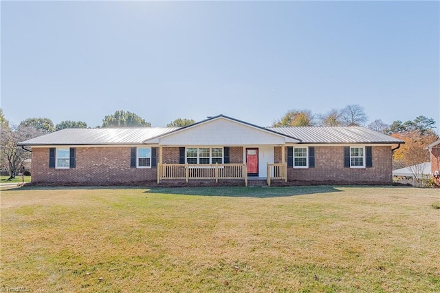 single story home featuring a porch and a front yard