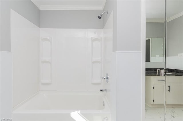 bathroom featuring shower / washtub combination, vanity, and ornamental molding