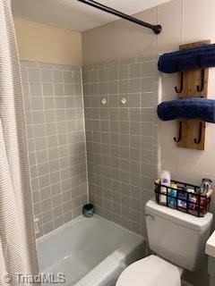 2920 Ramsgate Ct, Winston-Salem, NC 27106 - bathroom featuring shower / bathtub combination with curtain and vanity