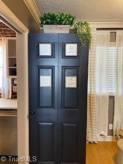 2920 Ramsgate Ct, Winston-Salem, NC 27106 - foyer featuring wood finished floors