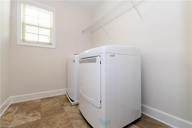 washroom featuring washer and dryer