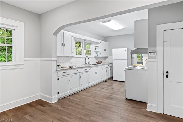 7090 Reynolda Rd, Pfafftown, NC 27040 - kitchen featuring white appliances, white cabinets, wood finished floors, and open shelves