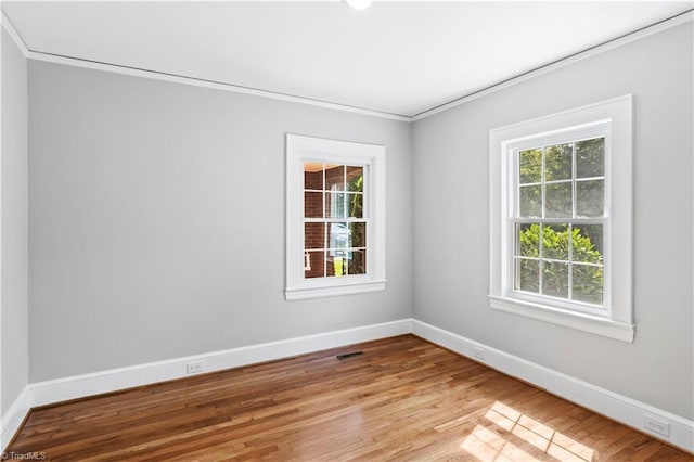 7090 Reynolda Rd, Pfafftown, NC 27040 - empty room with crown molding and wood finished floors