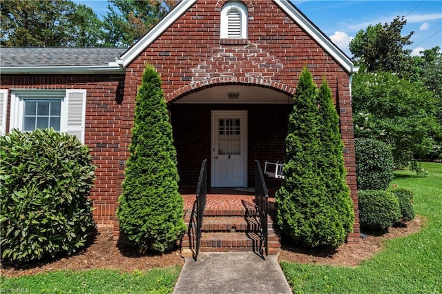 7090 Reynolda Rd, Pfafftown, NC 27040 - doorway to property featuring brick siding