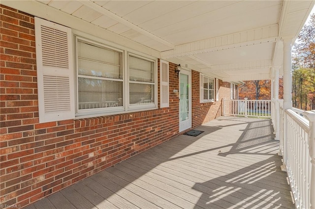 wooden deck featuring a porch