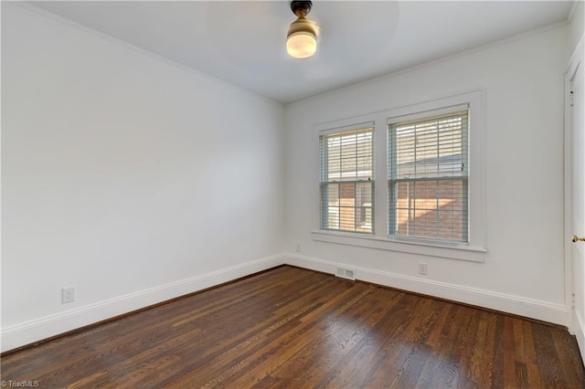 unfurnished room with dark wood-type flooring