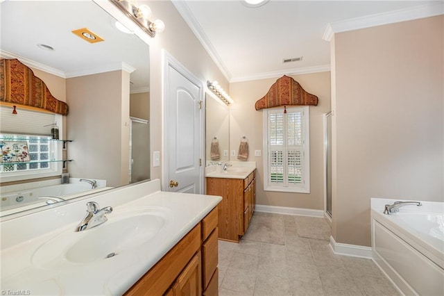 503 Sweetwater Ct, Clemmons, NC 27012 - bathroom with two vanities, a garden tub, a stall shower, and a sink