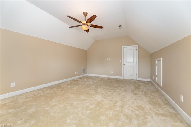 503 Sweetwater Ct, Clemmons, NC 27012 - additional living space with light colored carpet, vaulted ceiling, a ceiling fan, and visible vents