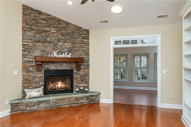 503 Sweetwater Ct, Clemmons, NC 27012 - unfurnished living room featuring a fireplace, visible vents, a ceiling fan, and hardwood / wood-style flooring