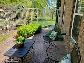 503 Sweetwater Ct, Clemmons, NC 27012 - view of patio with fence