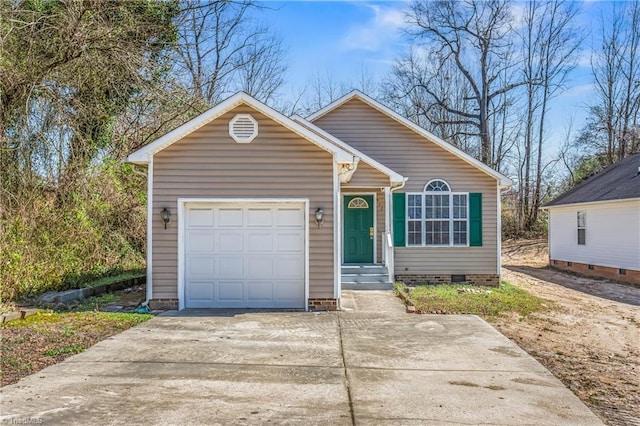 view of front facade with concrete driveway, a garage, and crawl space