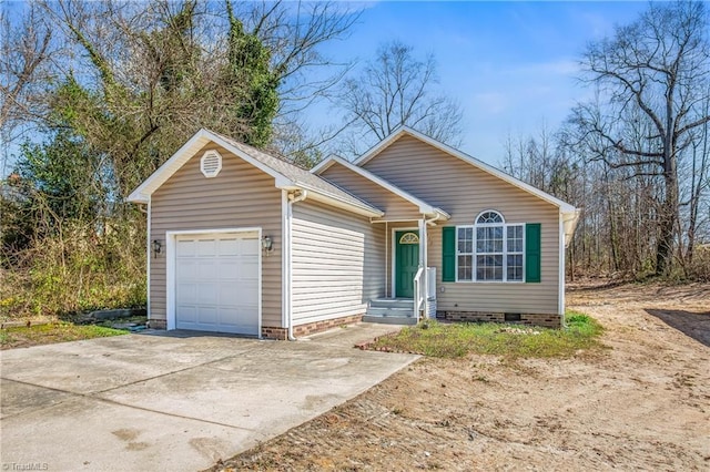 single story home with crawl space, a garage, and concrete driveway