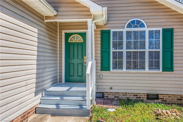 doorway to property featuring crawl space