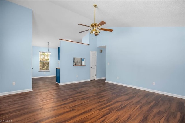 unfurnished living room featuring a textured ceiling, baseboards, dark wood-type flooring, and ceiling fan with notable chandelier