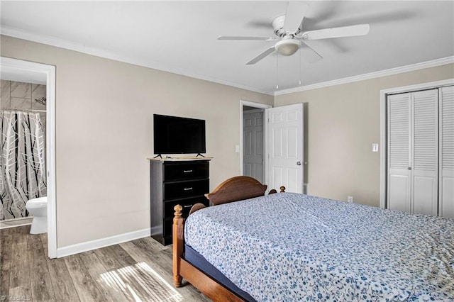 bedroom with hardwood / wood-style floors, ensuite bathroom, ceiling fan, and ornamental molding