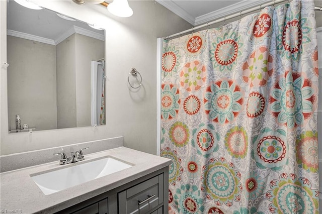 bathroom featuring vanity, a shower with shower curtain, and ornamental molding