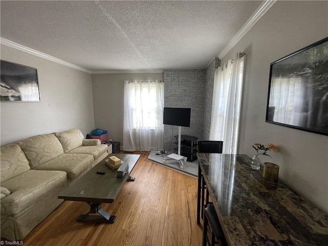 2820 Shady Lawn Dr, Greensboro, NC 27408 - living area with a textured ceiling, ornamental molding, and wood finished floors