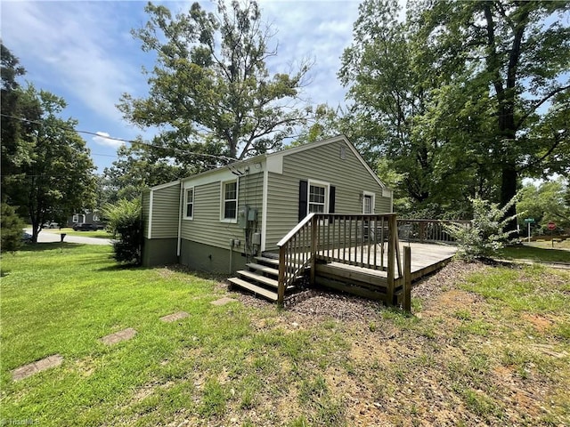 2820 Shady Lawn Dr, Greensboro, NC 27408 - view of front of house with a front yard, a deck, and crawl space