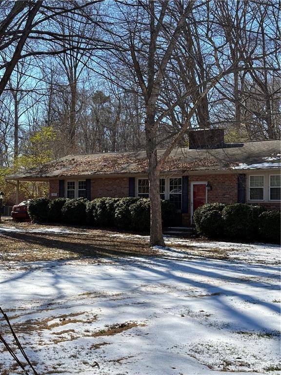 view of front of house with a carport