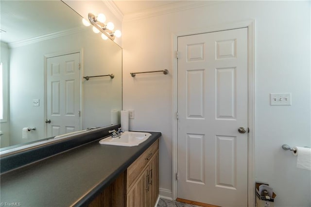 bathroom with crown molding and vanity