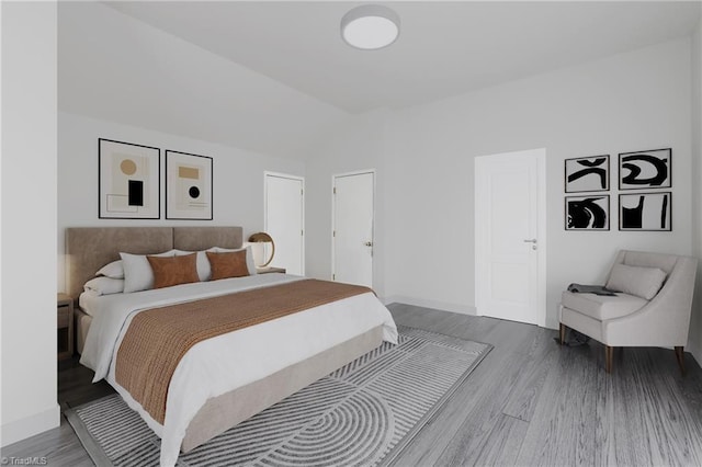 3542 Wayne White Rd, Climax, NC 27233 - bedroom with wood finished floors and lofted ceiling