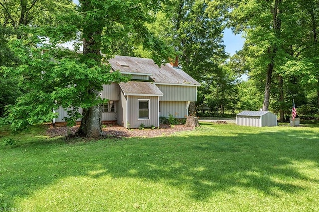 3542 Wayne White Rd, Climax, NC 27233 - view of grassy yard with a storage shed and view of scattered trees