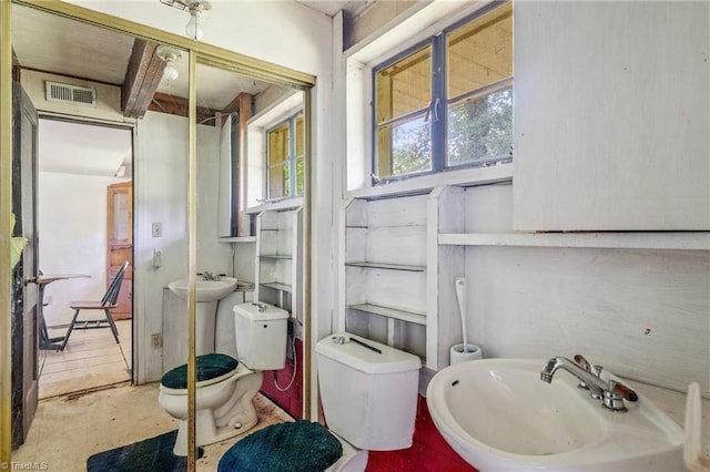 3542 Wayne White Rd, Climax, NC 27233 - half bathroom featuring a sink and toilet