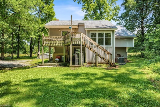 3542 Wayne White Rd, Climax, NC 27233 - back of property featuring stairway, a deck, a lawn, and roof with shingles