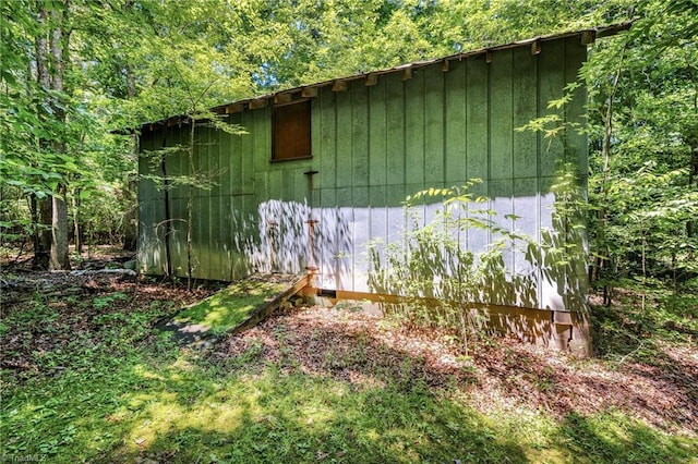 3542 Wayne White Rd, Climax, NC 27233 - view of side of home featuring an outbuilding