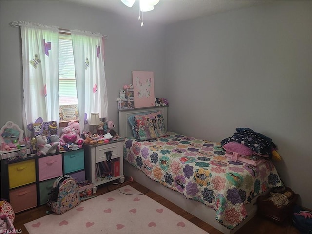 bedroom featuring wood finished floors