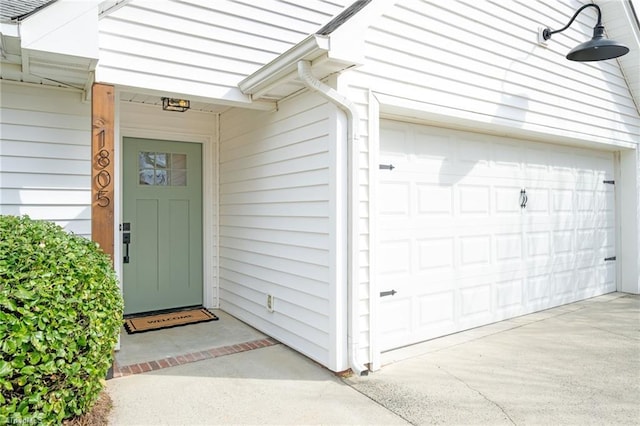 property entrance featuring a garage