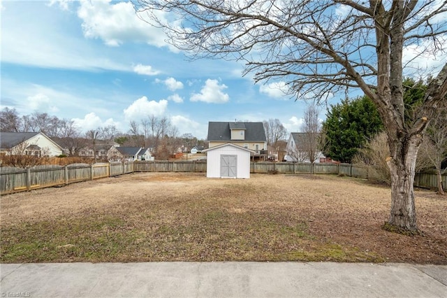 view of yard with a storage unit