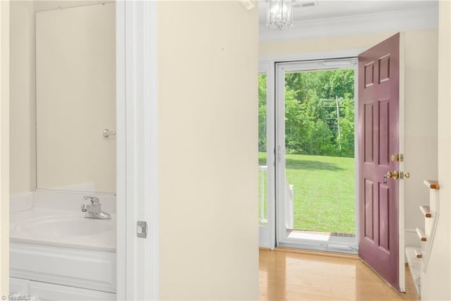 131 Hickory Creek Ct, Winston-Salem, NC 27107 - bathroom with vanity, wood finished floors, and crown molding
