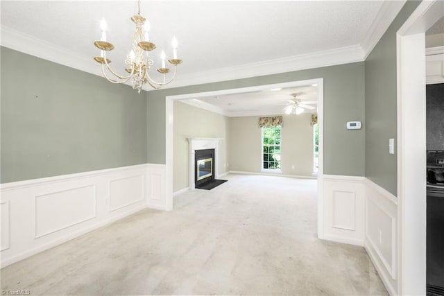 131 Hickory Creek Ct, Winston-Salem, NC 27107 - unfurnished living room with carpet, a chandelier, ornamental molding, wainscoting, and a premium fireplace