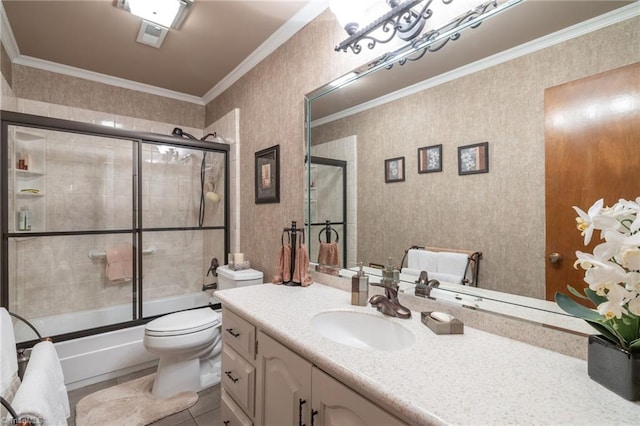 full bathroom with combined bath / shower with glass door, tile patterned flooring, vanity, toilet, and crown molding